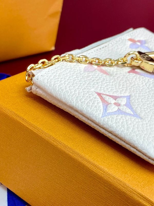 l0vis Vvtt0n limited edition key pouch purple beige m25597